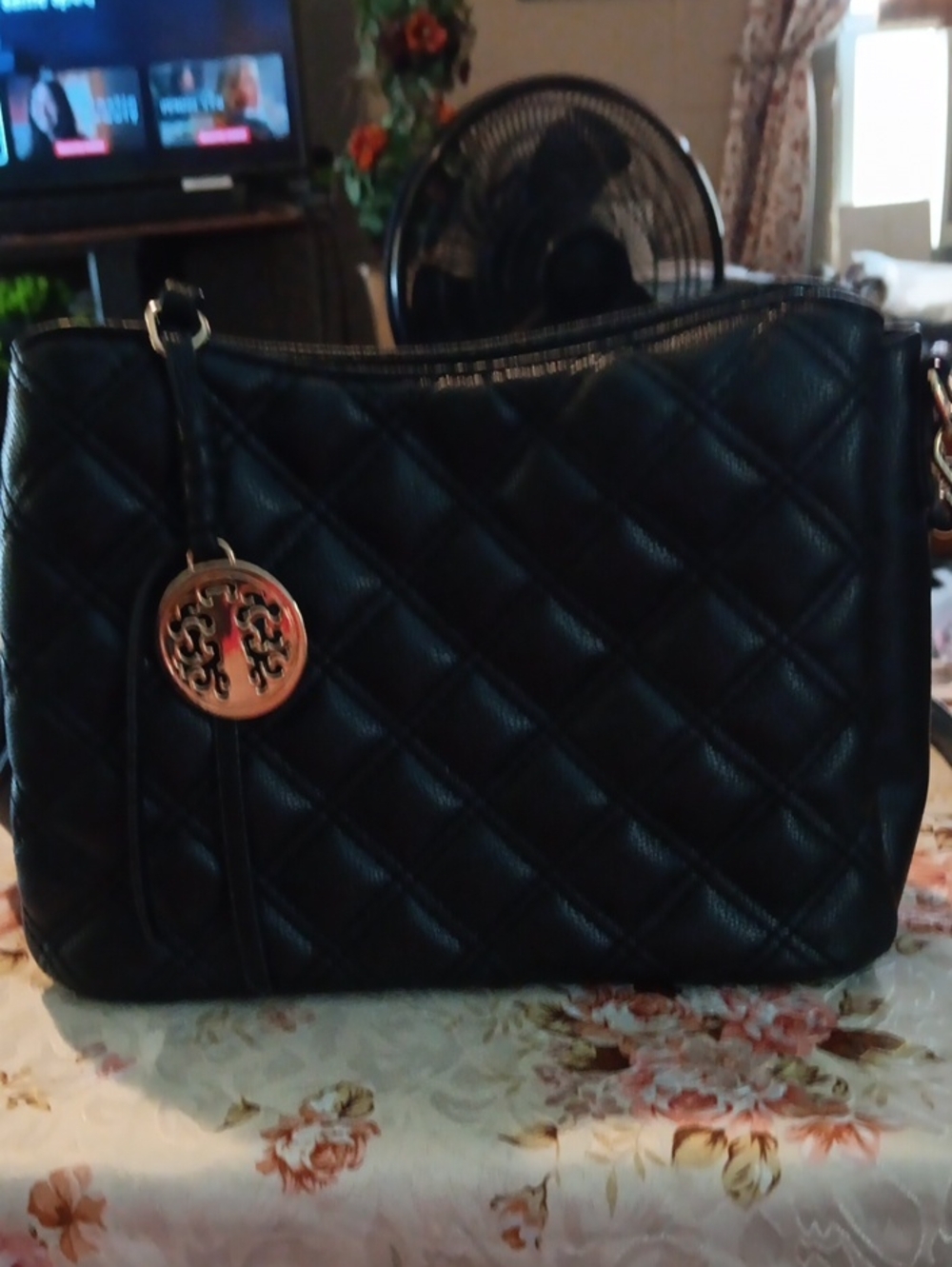 Quilted Black Crossbody Tote with Gold Medallion